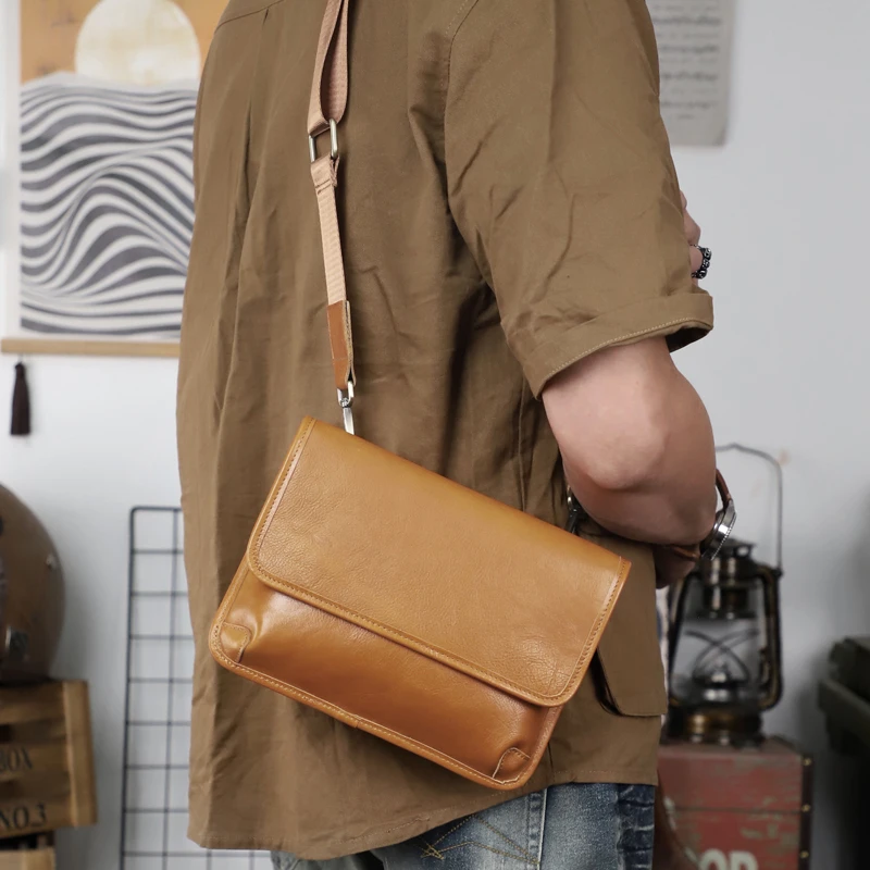 真皮男士包包单肩斜挎包小众通勤休闲小挎包复古植鞣牛皮邮差包潮