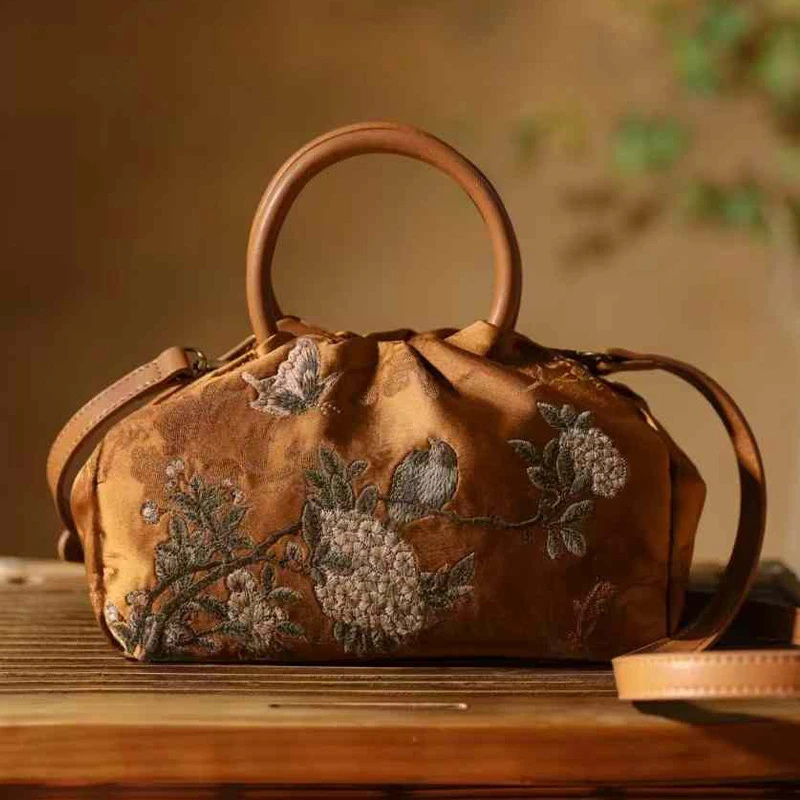 2024冬季新款特优美新中式国风气质提花刺绣金盏黄色手提包