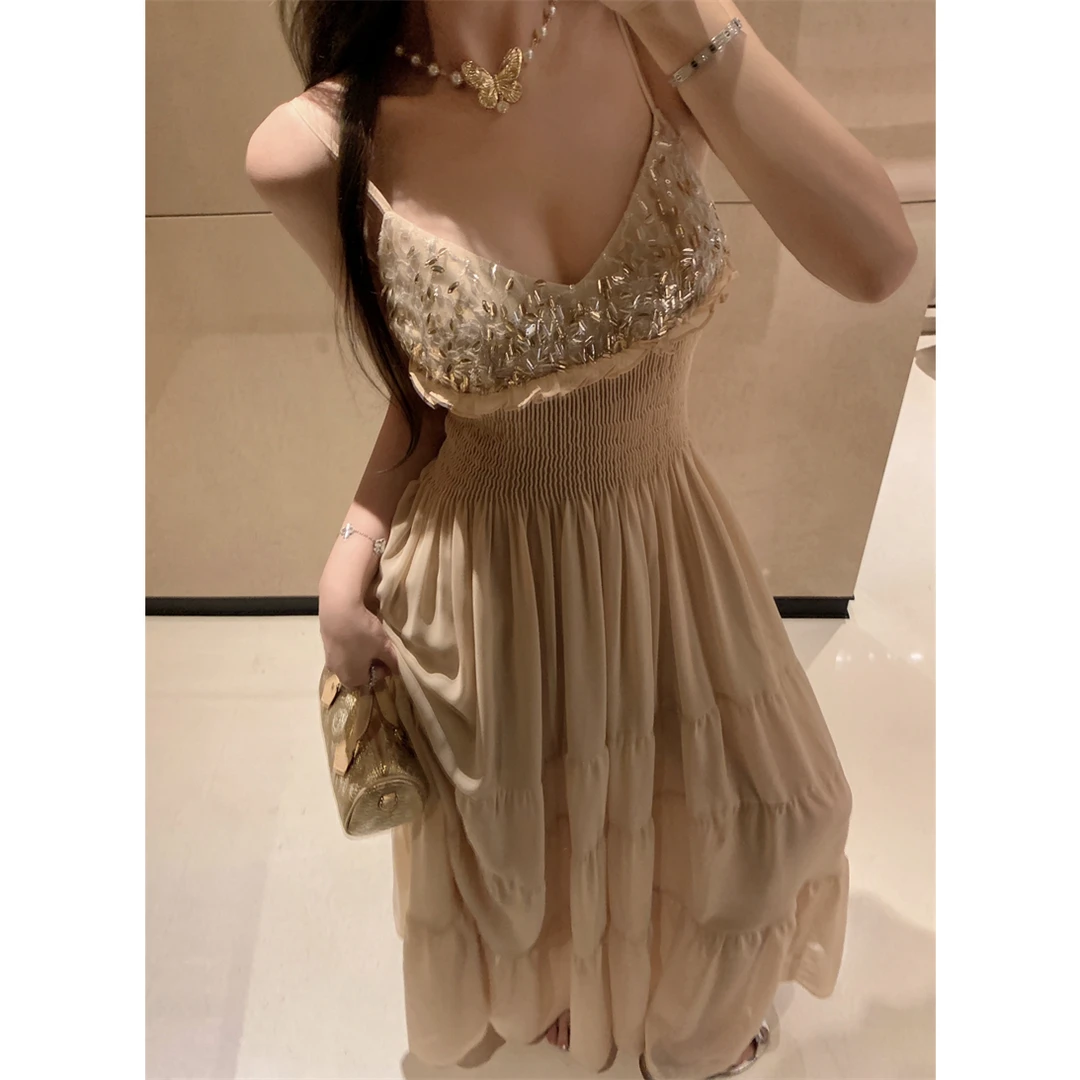 休闲千金收腰海边度假中长款绝美连衣裙女装露背a字吊带长裙夏季