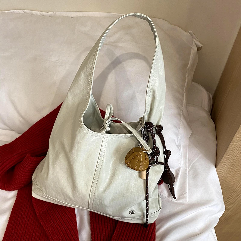 公子雯dp韩系秋冬新款包包小众蝴蝶结绑带软皮大容量腋下包hobo包