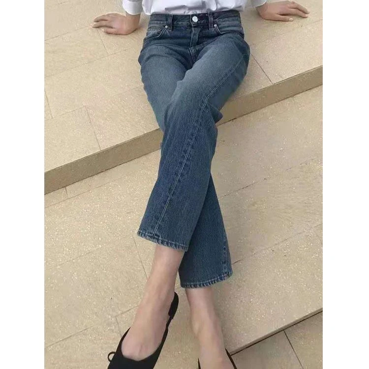 北欧简约款显瘦不对称纽缝牛仔女裤高品质休闲通勤款精品