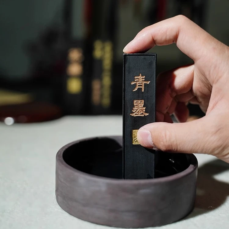 一得阁油烟墨块一两文房四宝漆烟墨锭二两手工磨墨汁研墨砚台专用