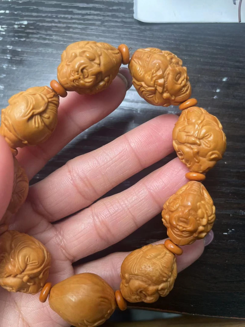 橄榄核雕刻小财神手串
