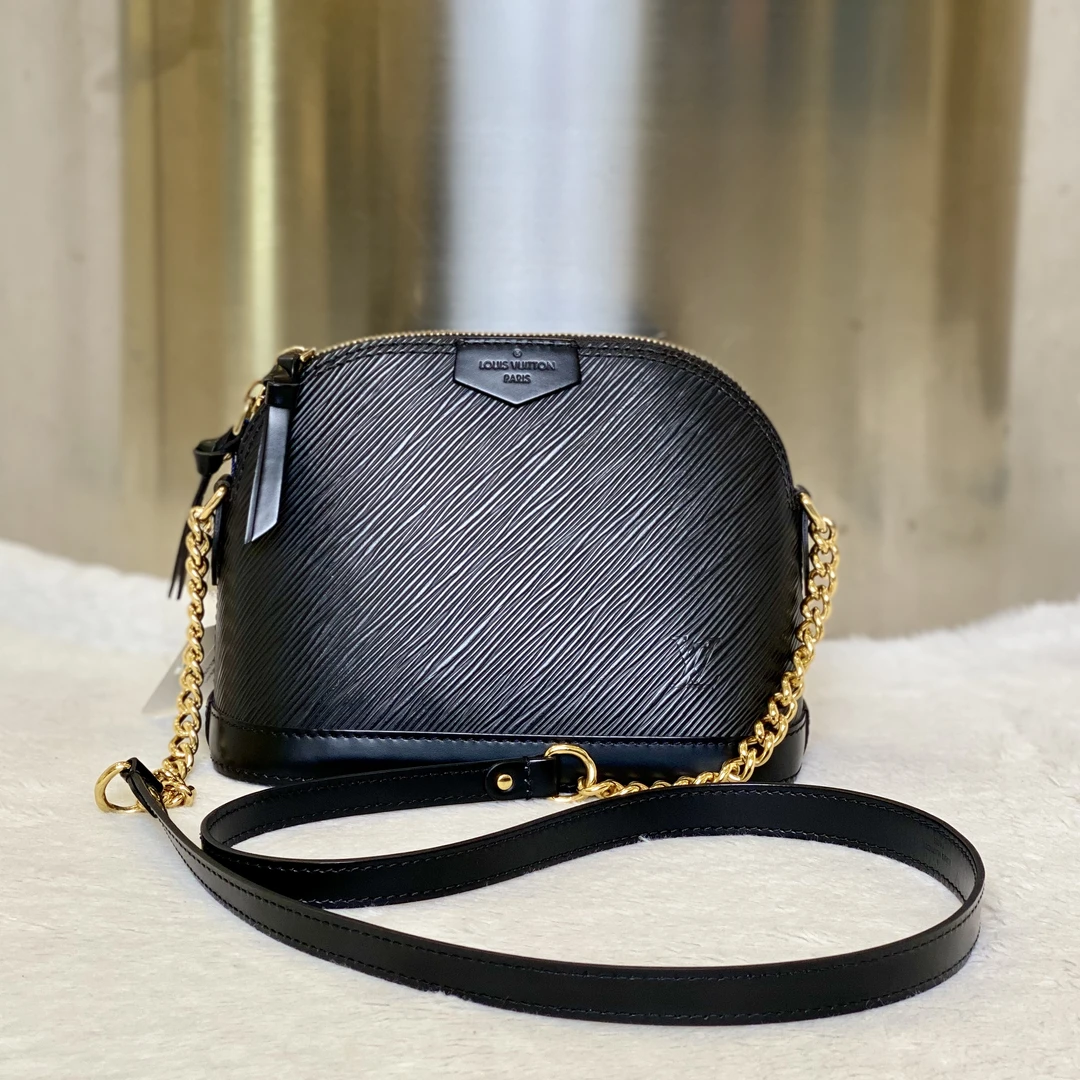 99新 LouisVuitton/路易威登 古有98新LV水波纹贝壳斜挎包5063