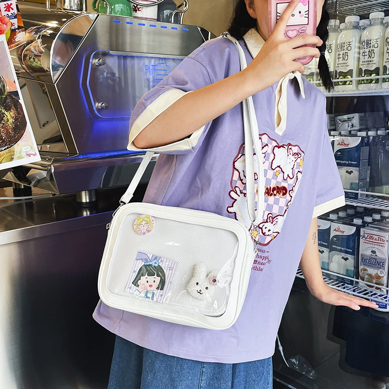 日系ins动漫周边可爱个性百搭街拍软妹学生痛包透明少女玩偶娃包