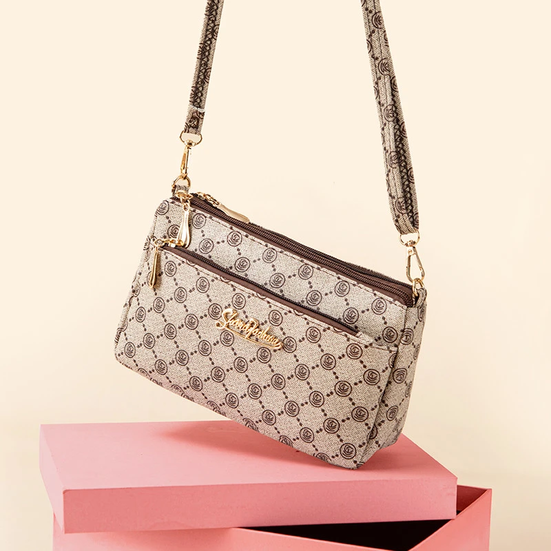 佐木希斜挎包包女单肩妈妈包中老年时尚中年休闲女士手机包斜跨包