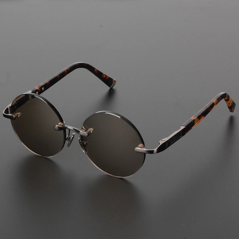 东海老石头水晶石眼镜清凉护目抗疲劳开车太阳镜正品复古圆墨镜