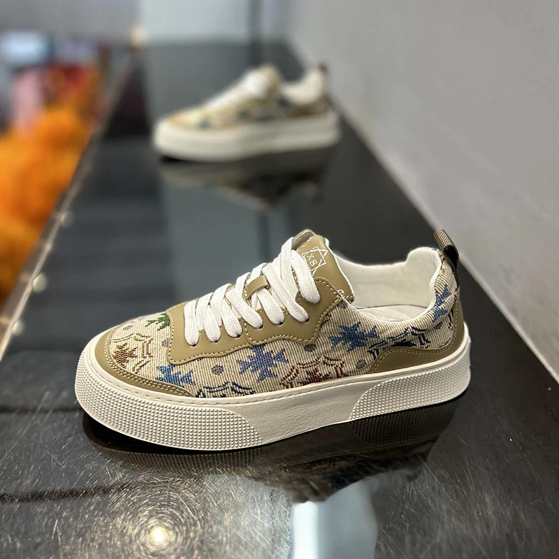 男鞋秋季新款潮牌复古印花透气帆布鞋男百搭透气学生运动休闲板鞋