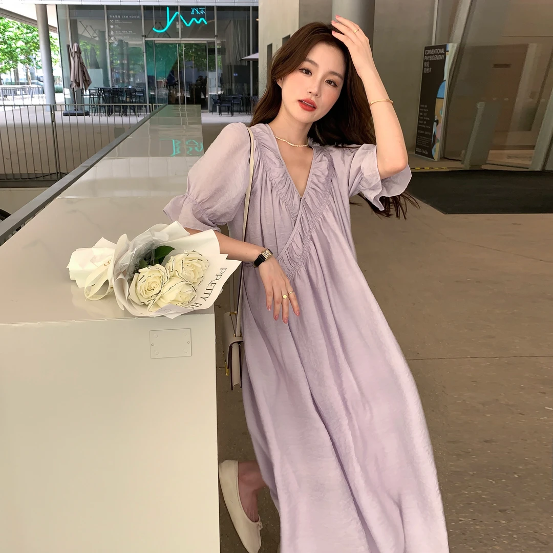 紫色绝美仙气连衣裙女2025夏季新款法式显瘦气质V领度假风长裙子