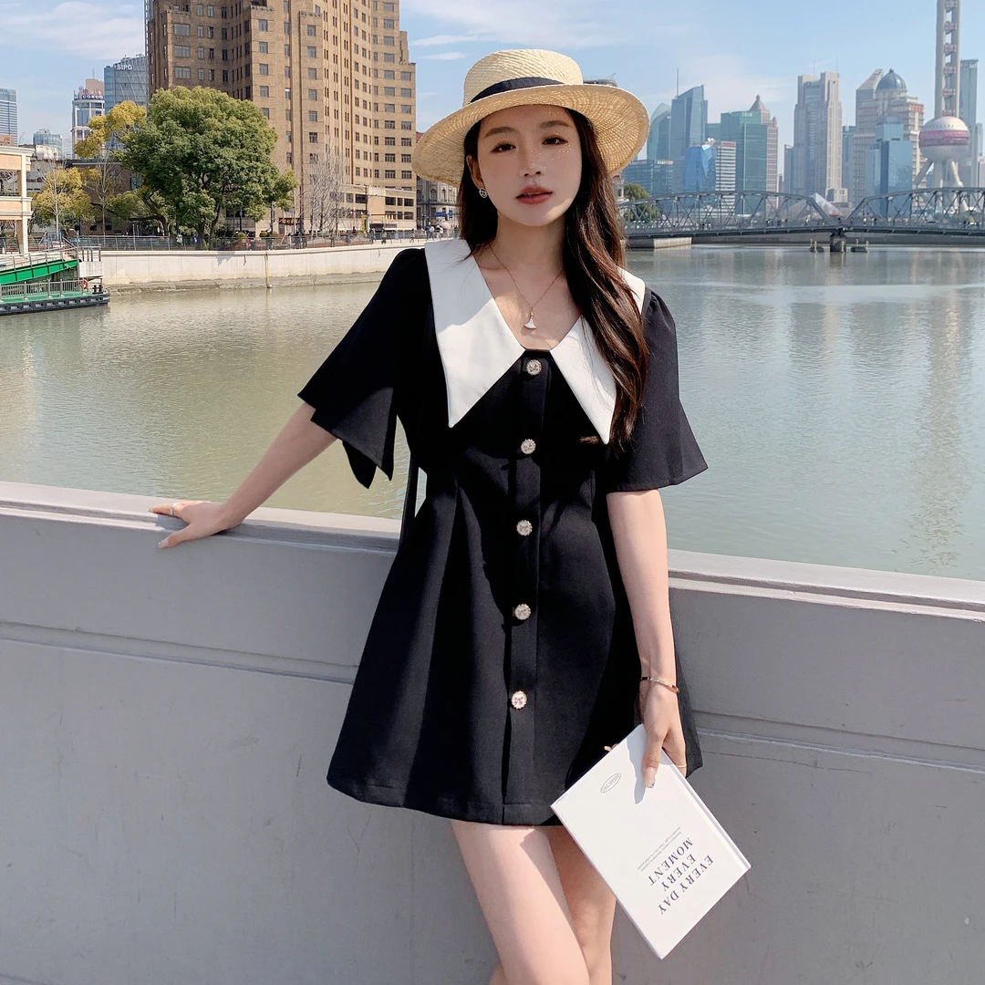 黑色小香风漂亮独特连衣裙女2025夏季新款娃娃领气质减龄a字短裙