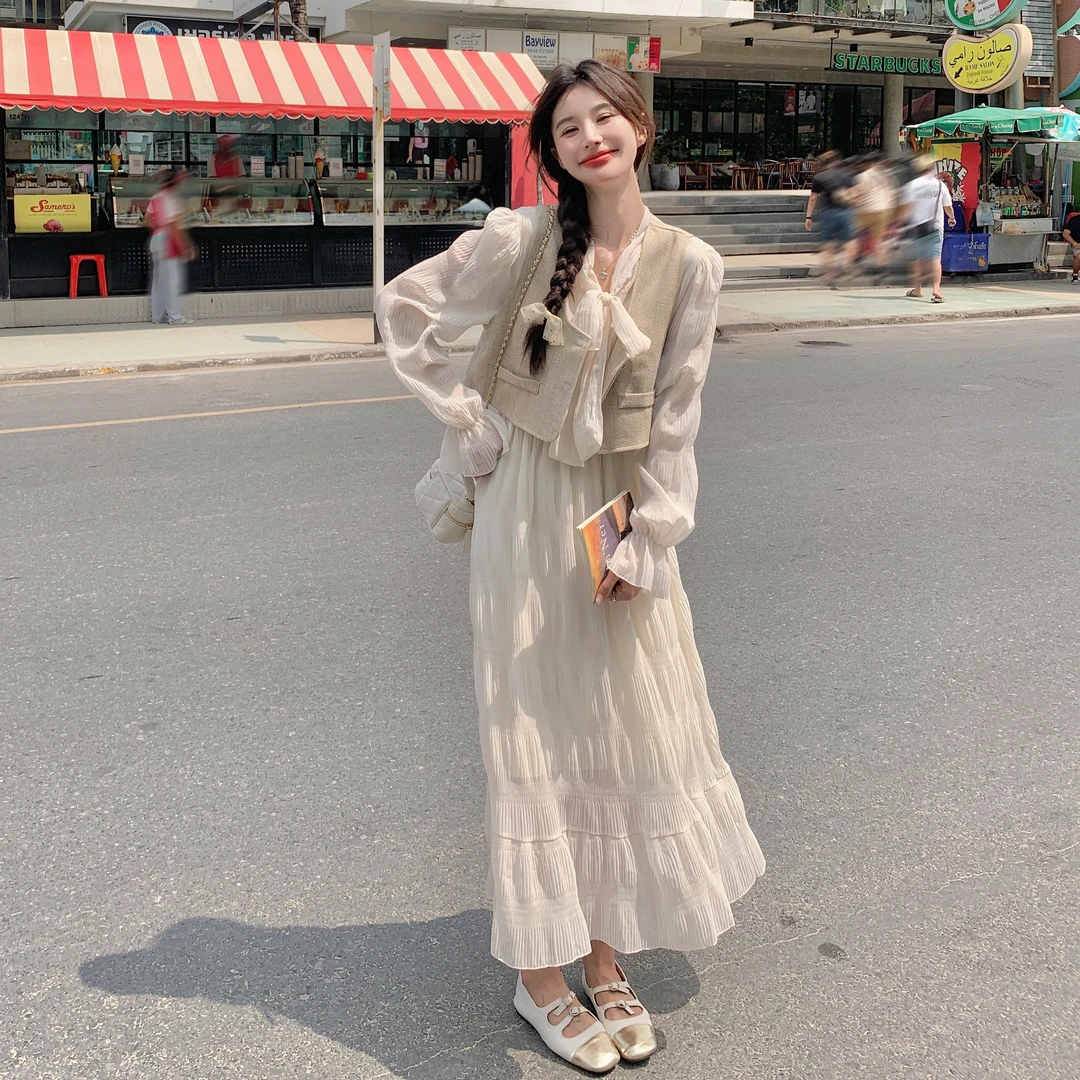 白色高级感气质连衣裙套装2025秋季新款小香风马甲收腰长裙两件套