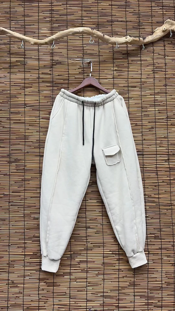 HY    73705一个翻边小口袋毛边收脚卫裤