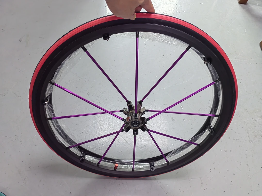 24寸运动轮椅充气后大轮钛合金花鼓6mm航空铝辐条运动耐磨外胎