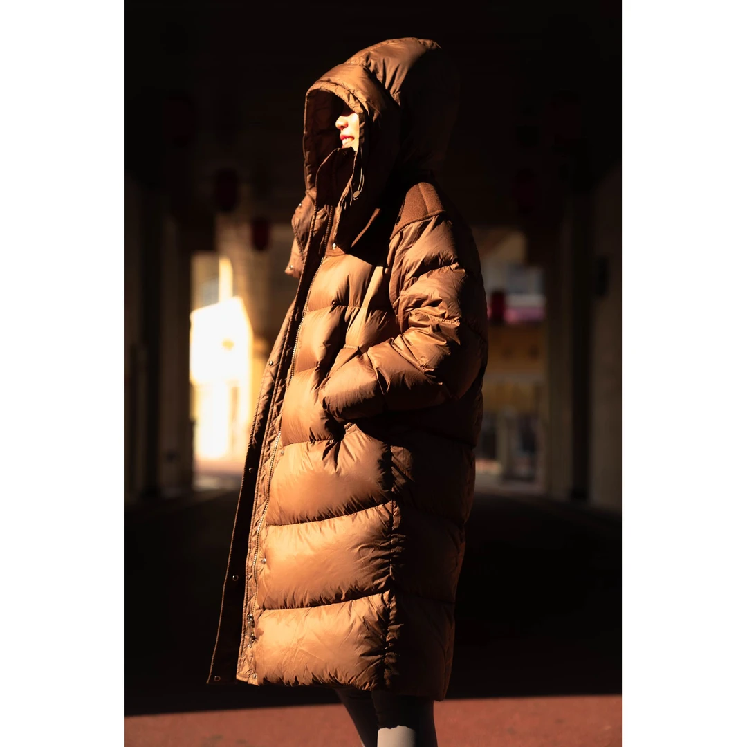 90鹅绒女式长款2024冬季气质轻奢时尚百搭抗寒连帽女士鹅绒服