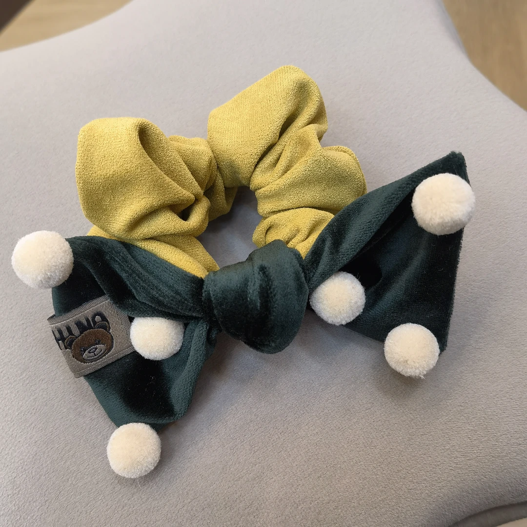 B683黄绿色蝴蝶结毛球拼色肠圈