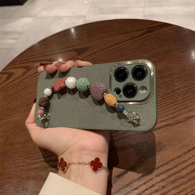 金属圈抹茶绿月坑纹苹果15/14手机壳iPhone13火山石手链12全包11