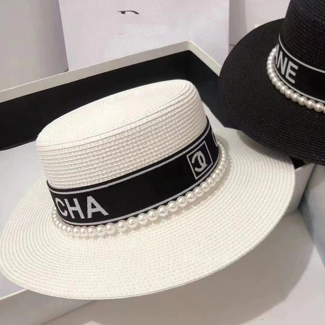 新款夏季草帽手工织带帽子女韩式大牌平顶礼帽沙滩遮阳帽子潮百搭