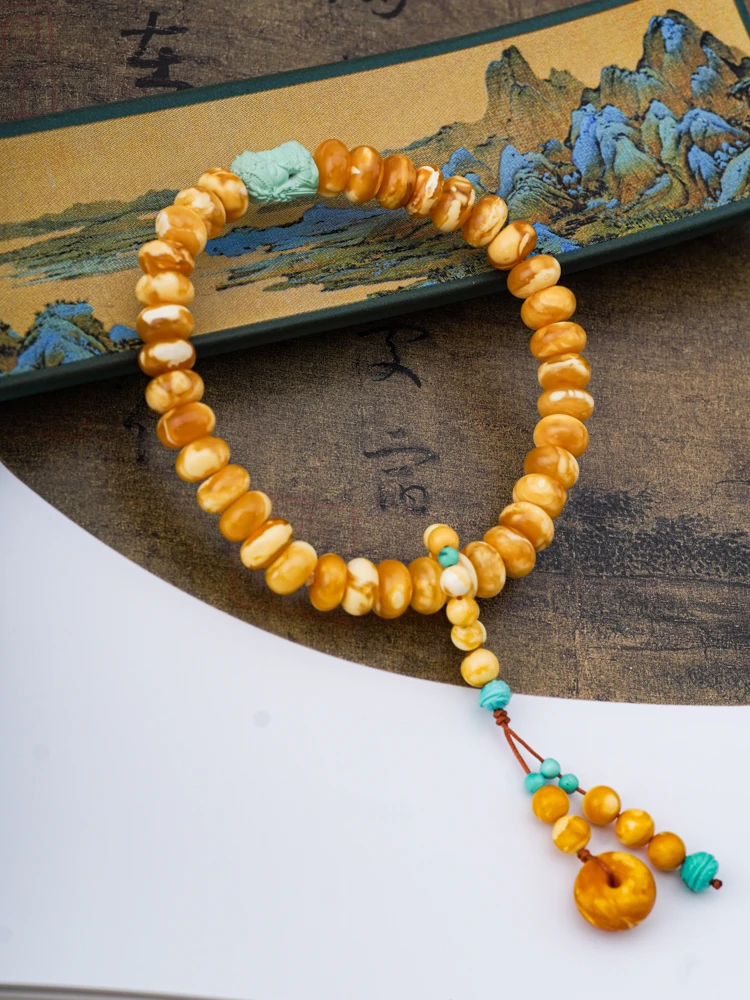 天然琥珀蜜蜡妖花算盘珠手串