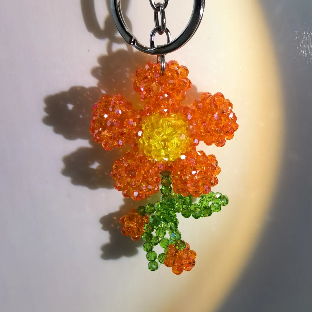 手工编织橘色花花吊坠钥匙扣挂件