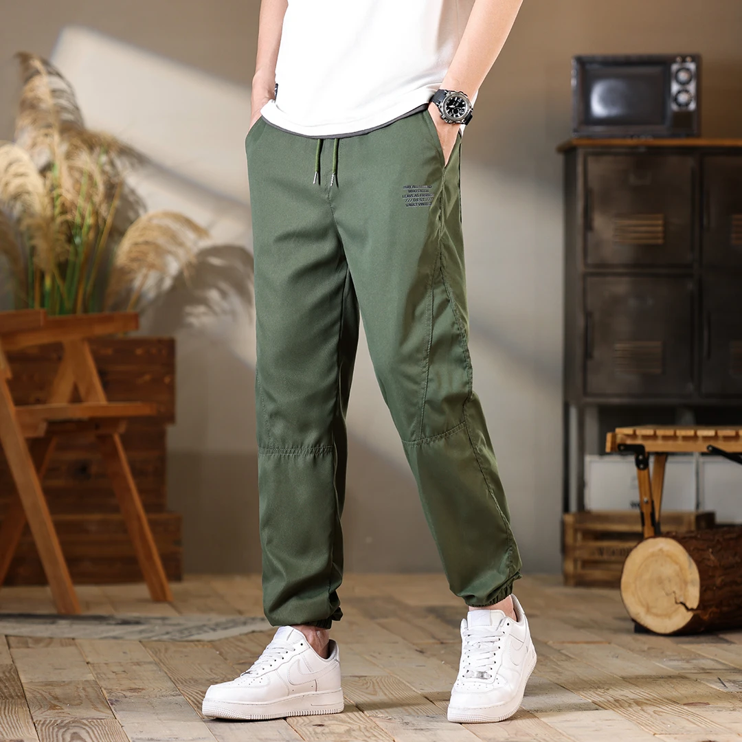 潮牌哈伦裤男士宽松紧腰束脚百搭休闲裤子男军绿色工装裤九分长裤