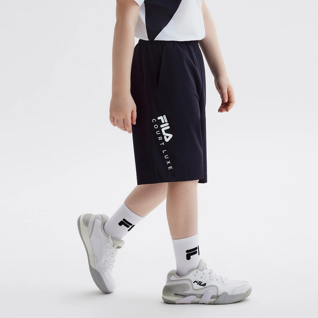 FILA/斐乐儿童男中大童运动短裤夏网球系列针织五分裤K12B423604F