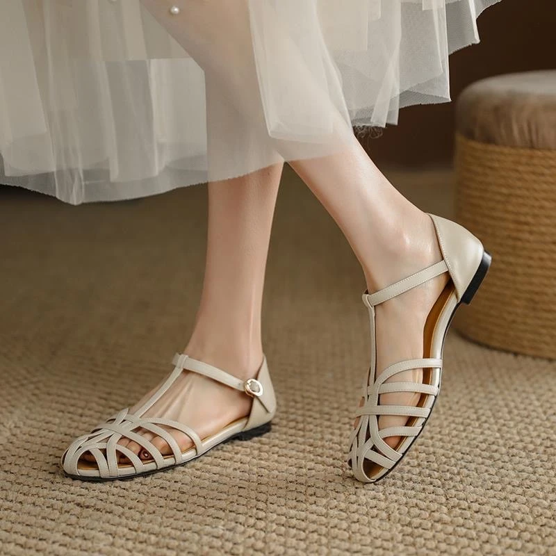 步狮登包头凉鞋女夏度假风复古时尚气质高级感镂空编织平底罗马鞋