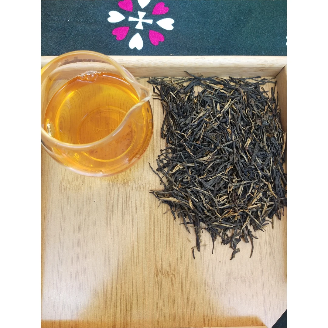 滇红经典58，条索紧直，汤色橙光明亮，香气熟果香，木质香花香