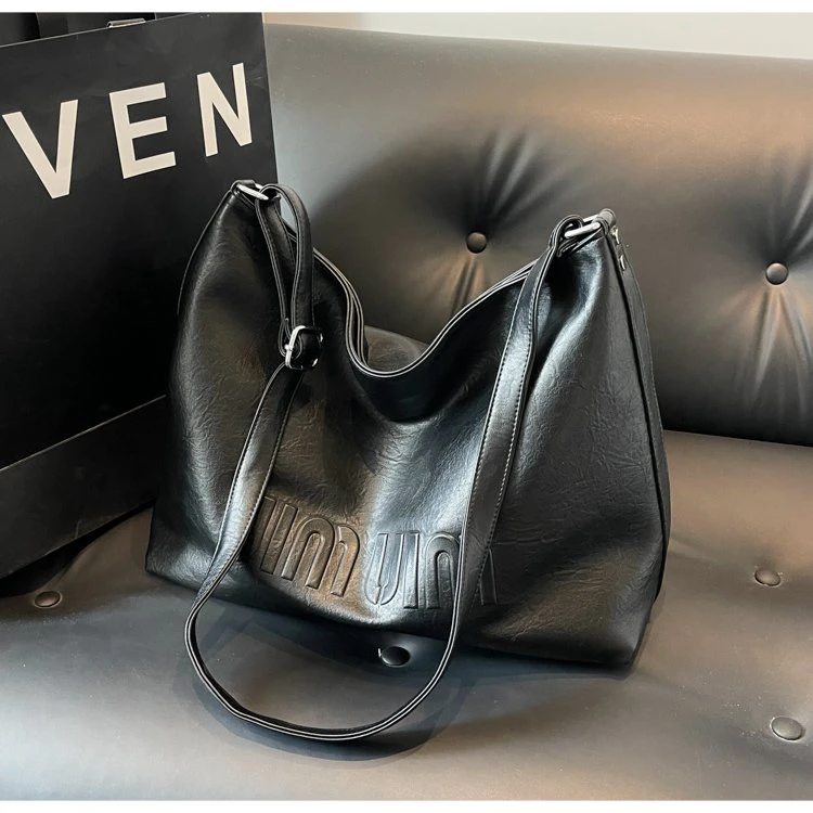 大容量包包女2024新款单肩斜挎百搭韩版水桶包复古质感通勤托特包