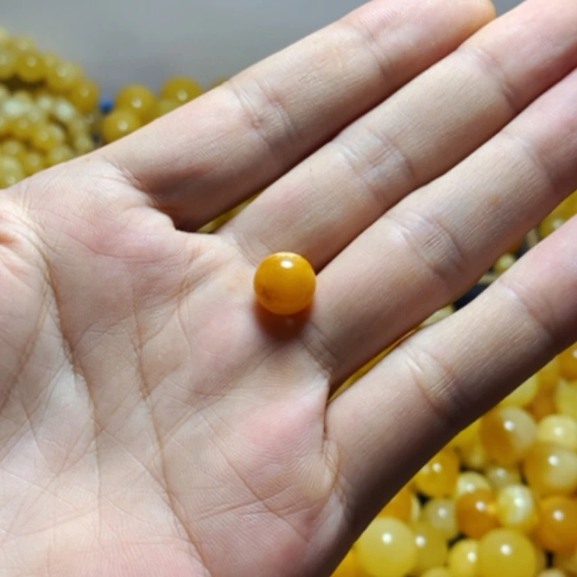 【闪购商品】琥珀裸石未镶嵌天然蜜蜡鸡油黄圆珠