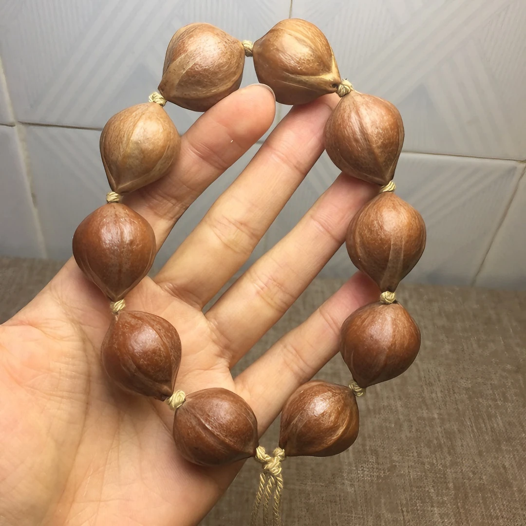 橄榄核原皮2.0大籽正圆光珠原料核颗颗可出精品原珠素串