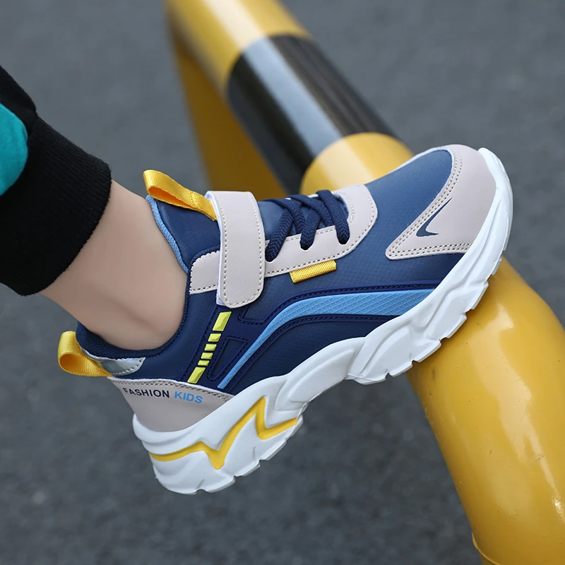 安踏流行冬鞋男童鞋中大童春季皮面防水小学生帅气儿童运动鞋男孩