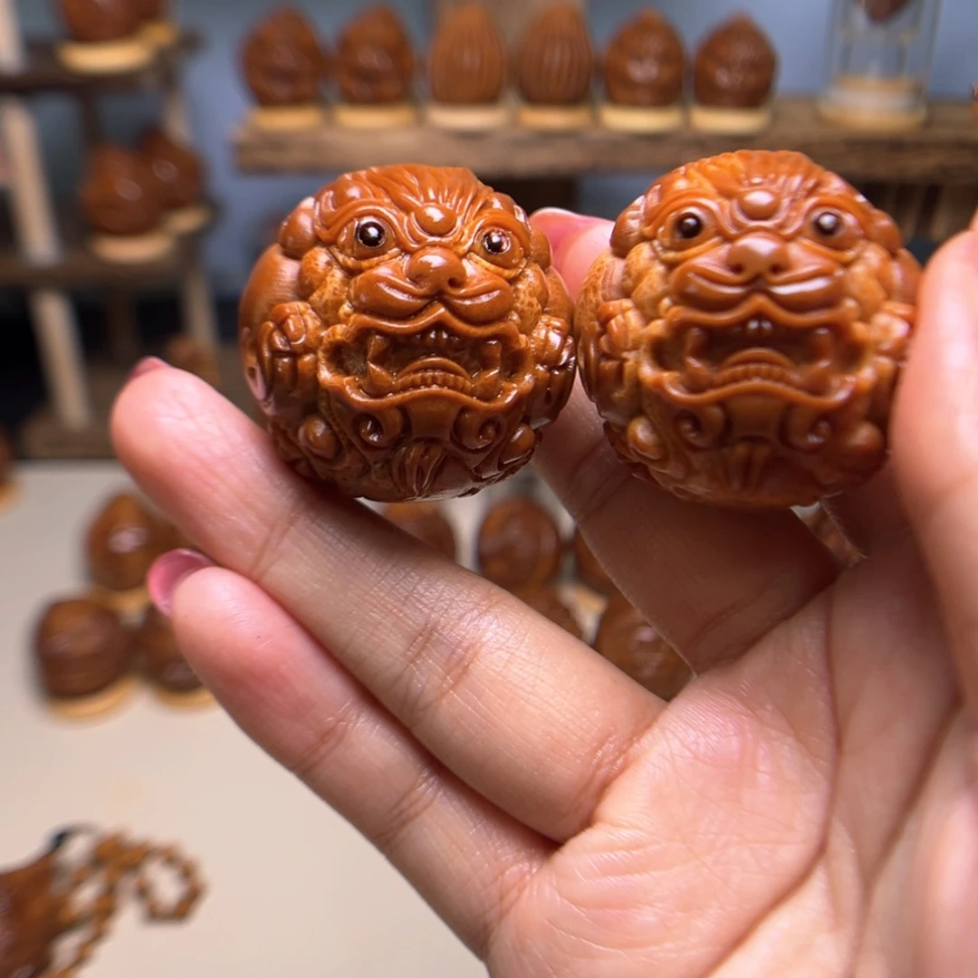 橄榄核核雕三四左右圆貔貅一对