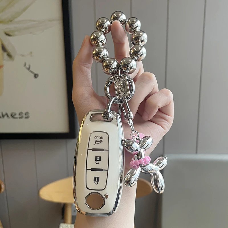 适用于日产轩逸车钥匙套尼桑逍客天籁壳奇骏蓝鸟楼兰骐达简约扣包