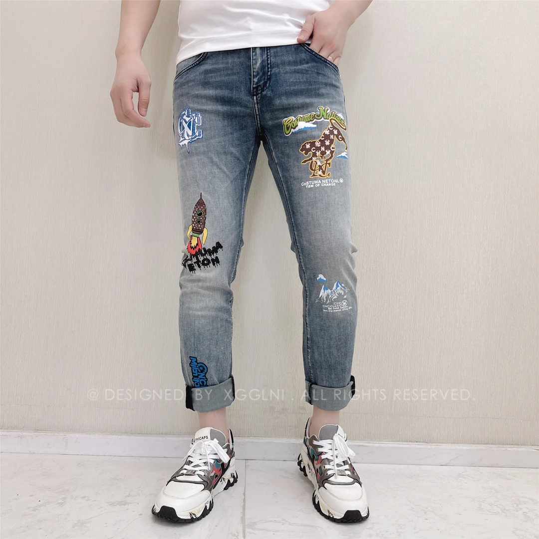 春夏款JX烫胶火箭喷字母轻奢高端牛仔裤男款高档时尚修身裤男裤子