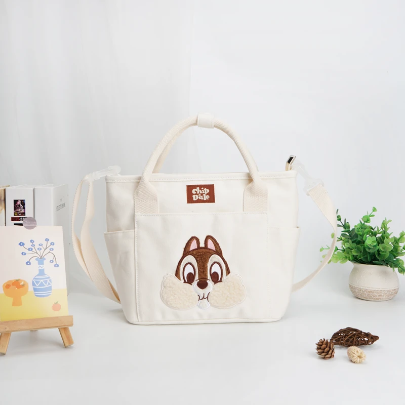 蜂蜜罐迪士尼奇奇蒂蒂火腿猪抱抱龙小美手提斜挎包卡通帆布女款包