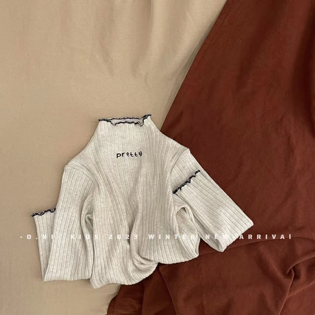 【编号C670】H6097-12-儿童高领印花打底衫米色-O.ni