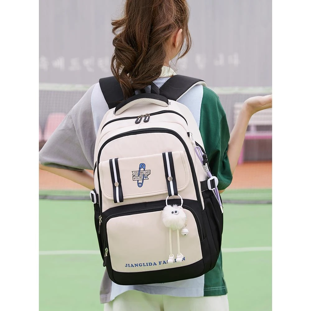 法国2023新款减负护脊初中生书包女生高中生小学生大容量双肩背包