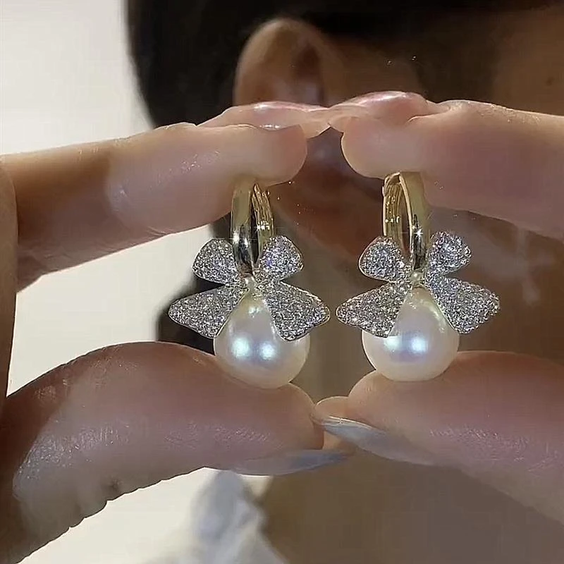 925银耳饰 蝴蝶结仿珍珠耳饰耳环气质轻奢小众设计高级精致耳环女