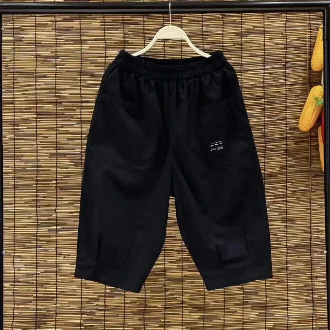 2024年夏季大口袋休闲七分裤大码女装宽松纯色舒适减龄松紧腰裤子