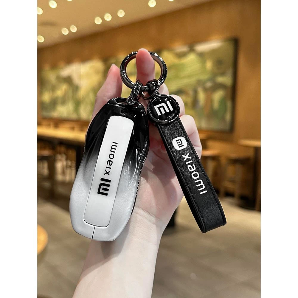 适用于小米su7钥匙套2024款配件男士汽车智能按键专用改装包扣壳