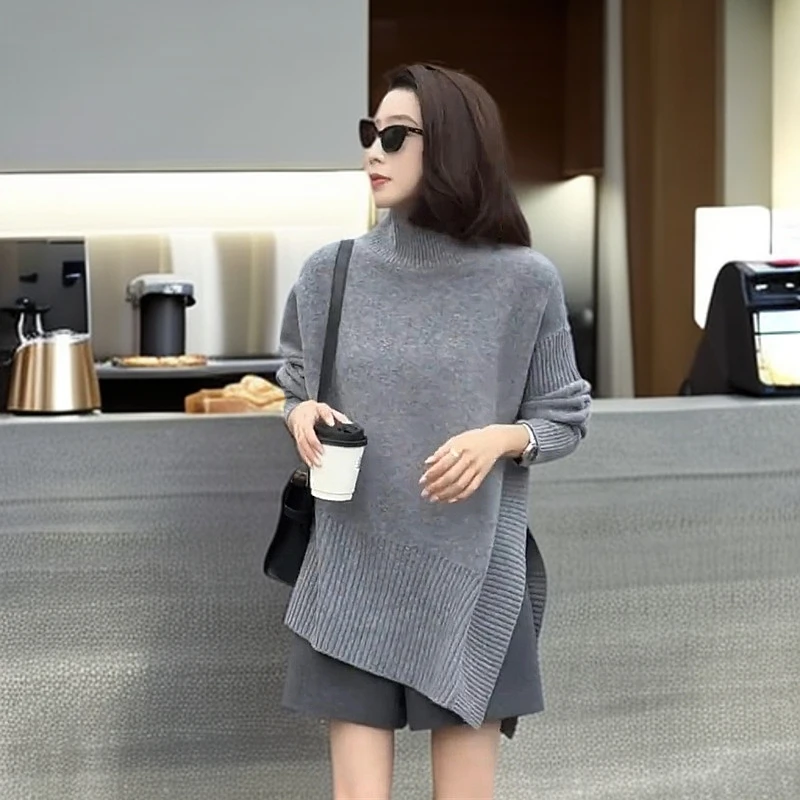 韩系气质减龄高级感针织衫女2025春季新款设计感下摆开叉立领上衣