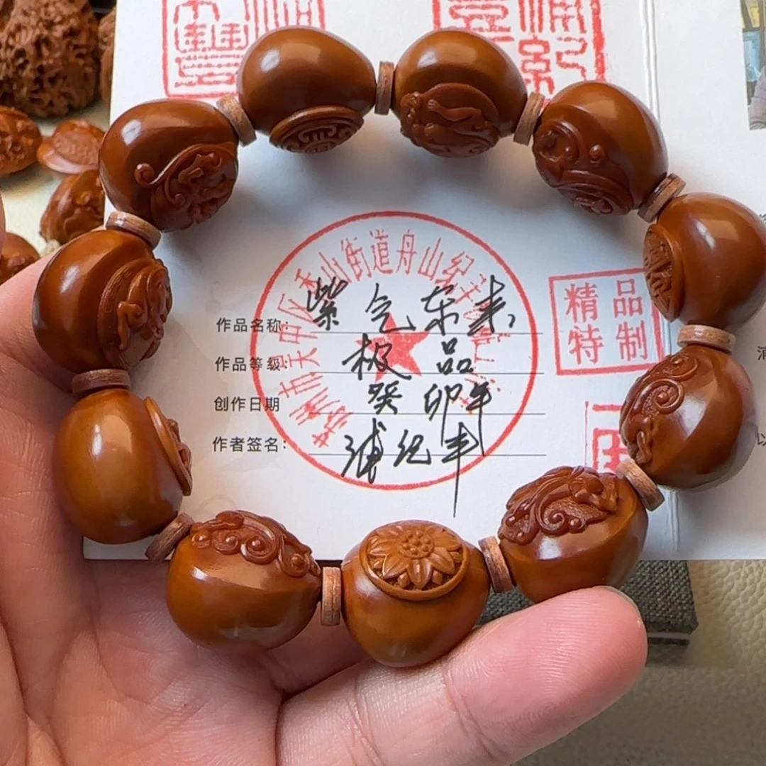 橄榄核核雕浦纪丰紫气东来手串