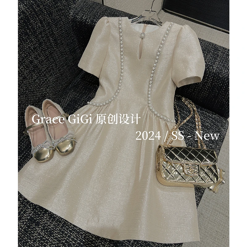 【银河碎梦】原创设计师2025春夏新款设计感微收腰小香风A字连衣裙