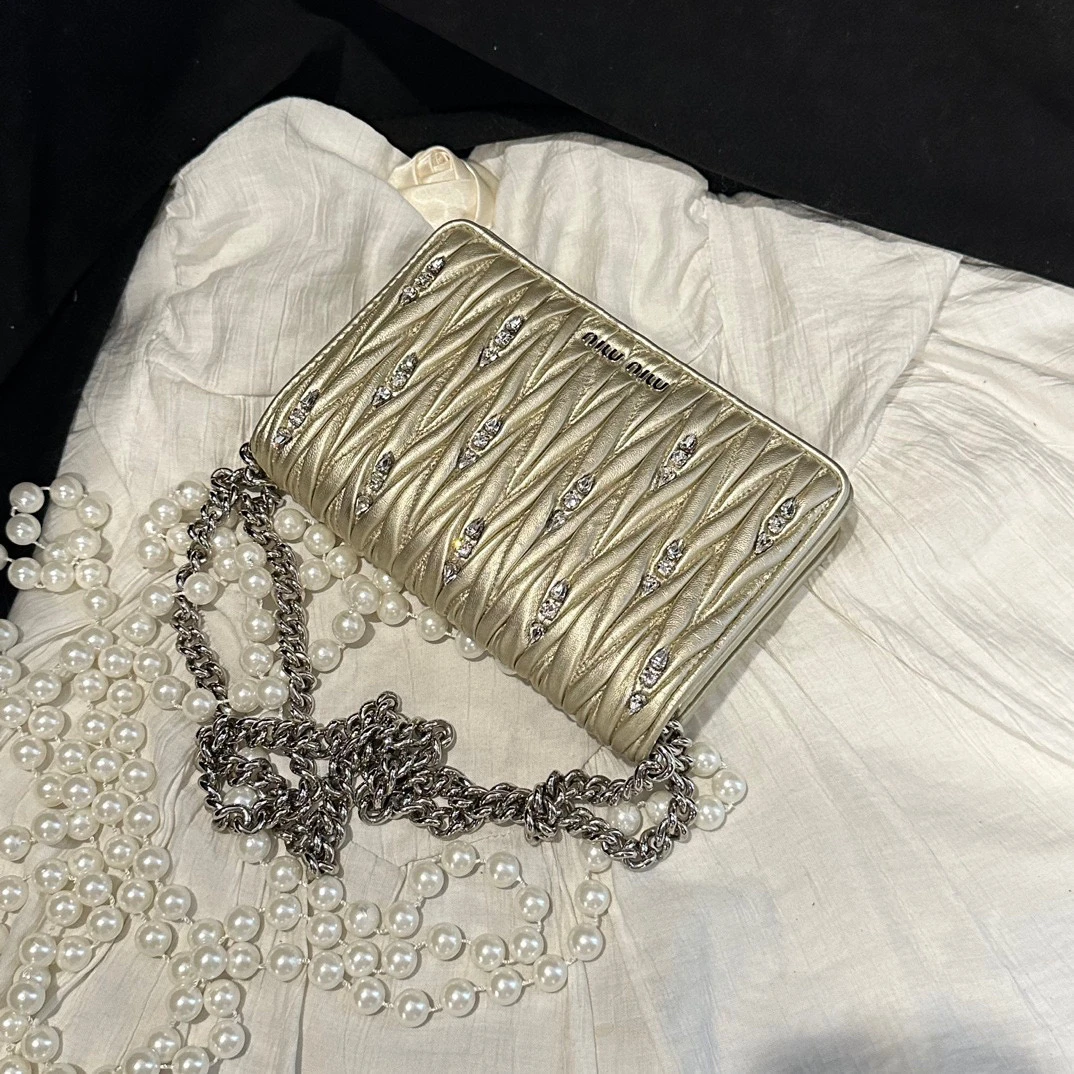 95新 MIU MIU/缪缪 miumiu香槟金woc链条包