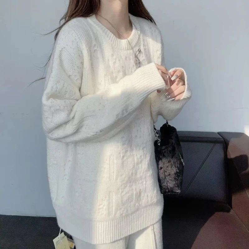 JIE NA YANG 轻奢231539-温柔慵懒风镂空圆领针织羊绒套头衫