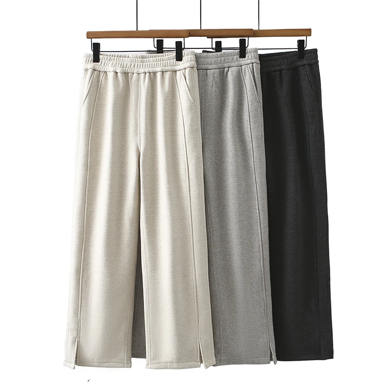 卡洛町大码女装110-210冬季新款百搭宽松窄版下摆开叉直筒裤8673