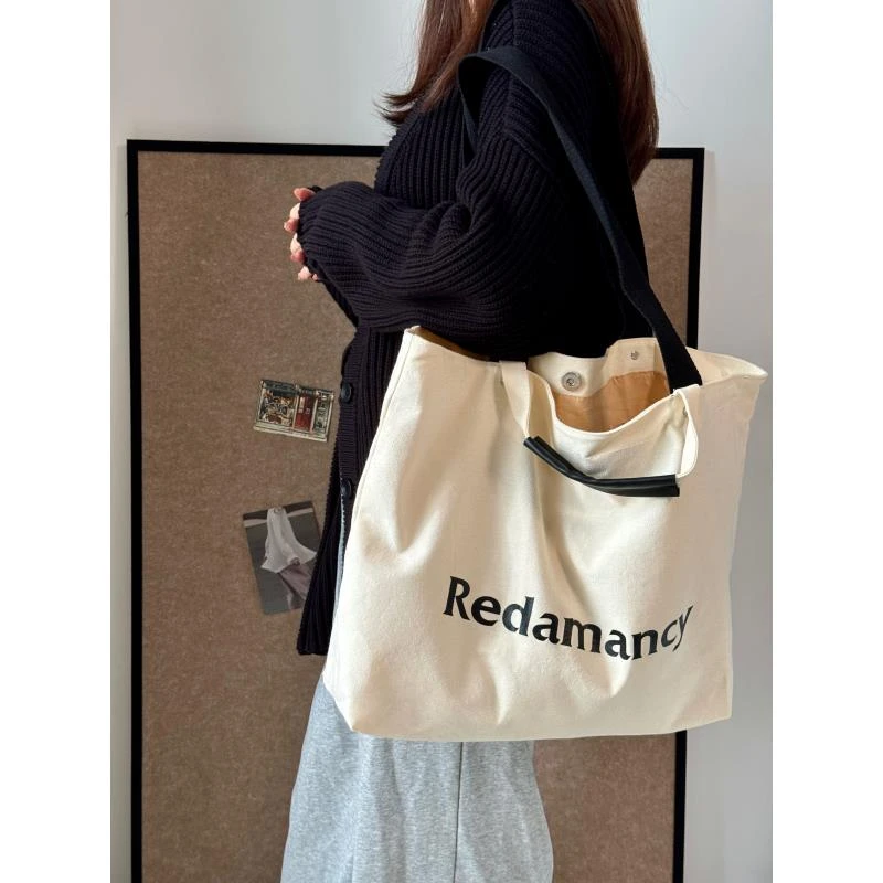 【菜芽子】百搭通勤帆布包包2025新款便携包大容量单肩包手提托特包