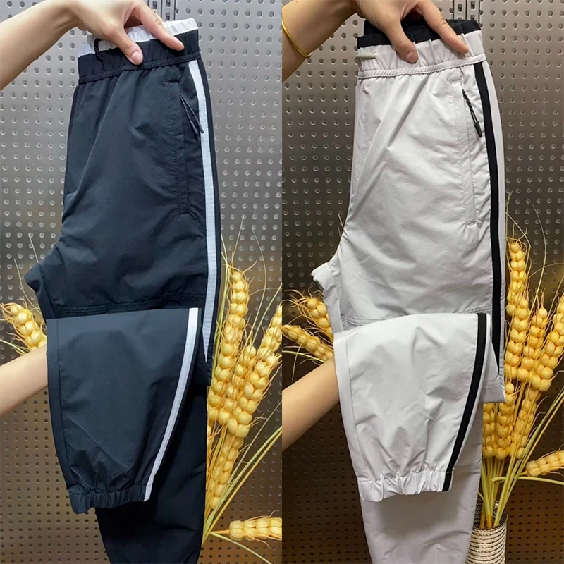 秋季新款男士休闲裤结构设计工装风宽松束脚裤潮流百搭拼接哈伦裤