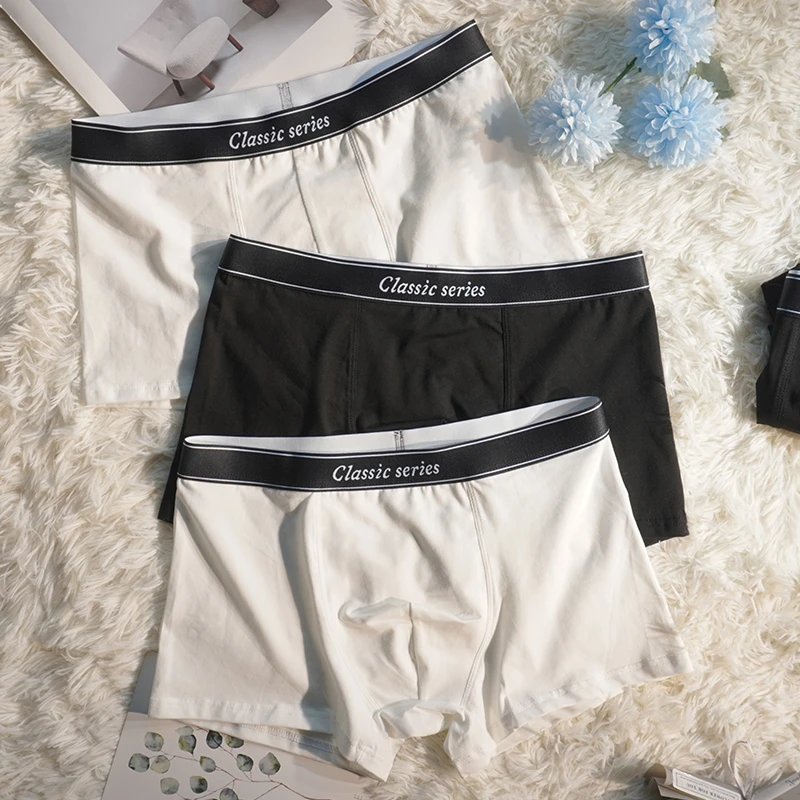 内裤男士青少年男生透气裤头中腰白色黑色秋冬季四角平角潮流短裤