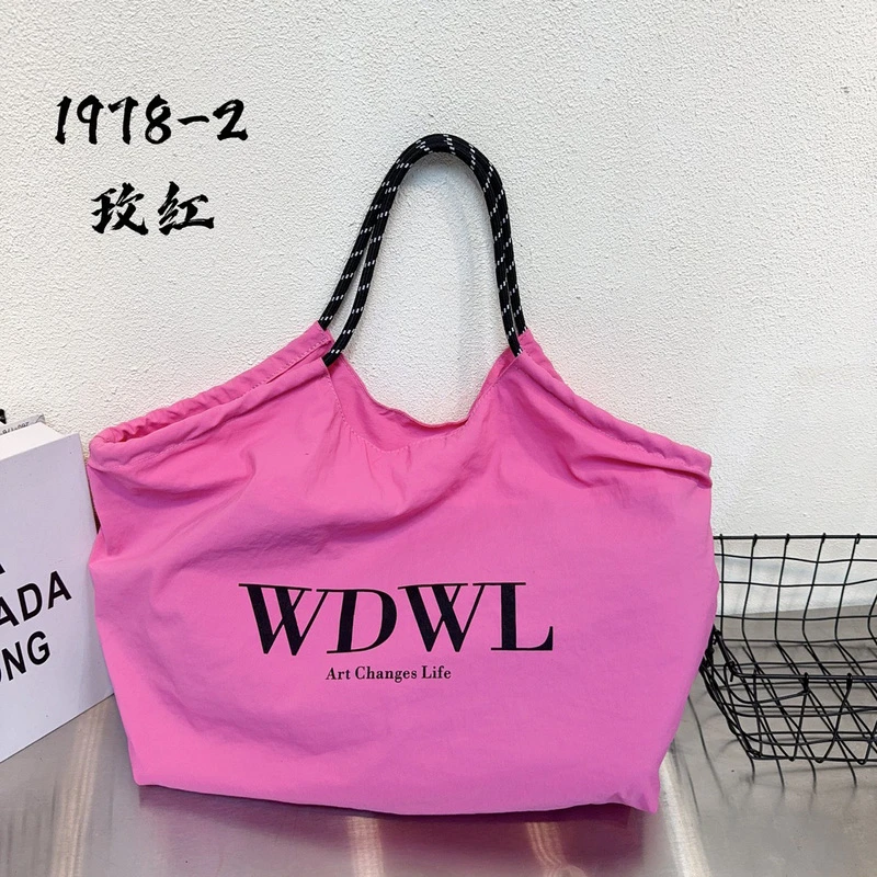 粉色简约大容量托特包包尼龙包通勤新款学生字母百搭单肩休闲